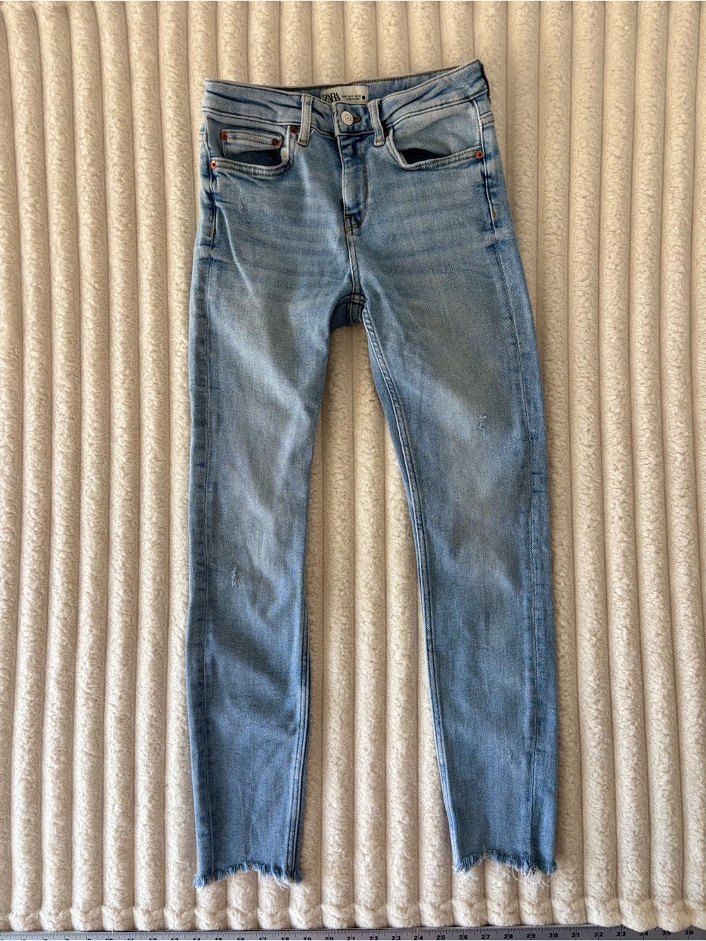 Zara Light Wash Skinny Jeans with Frayed Hem